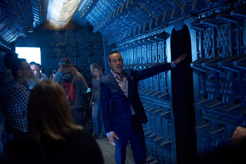 Joseph Mallozzi shows off a starship set. Image: Steve Wilkie/Syfy